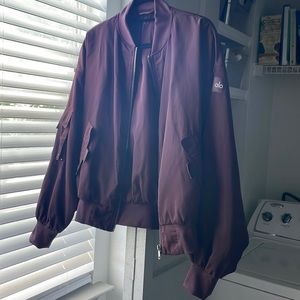 Alo wine colored bomber jacket size S. Great condition. $100 OBO